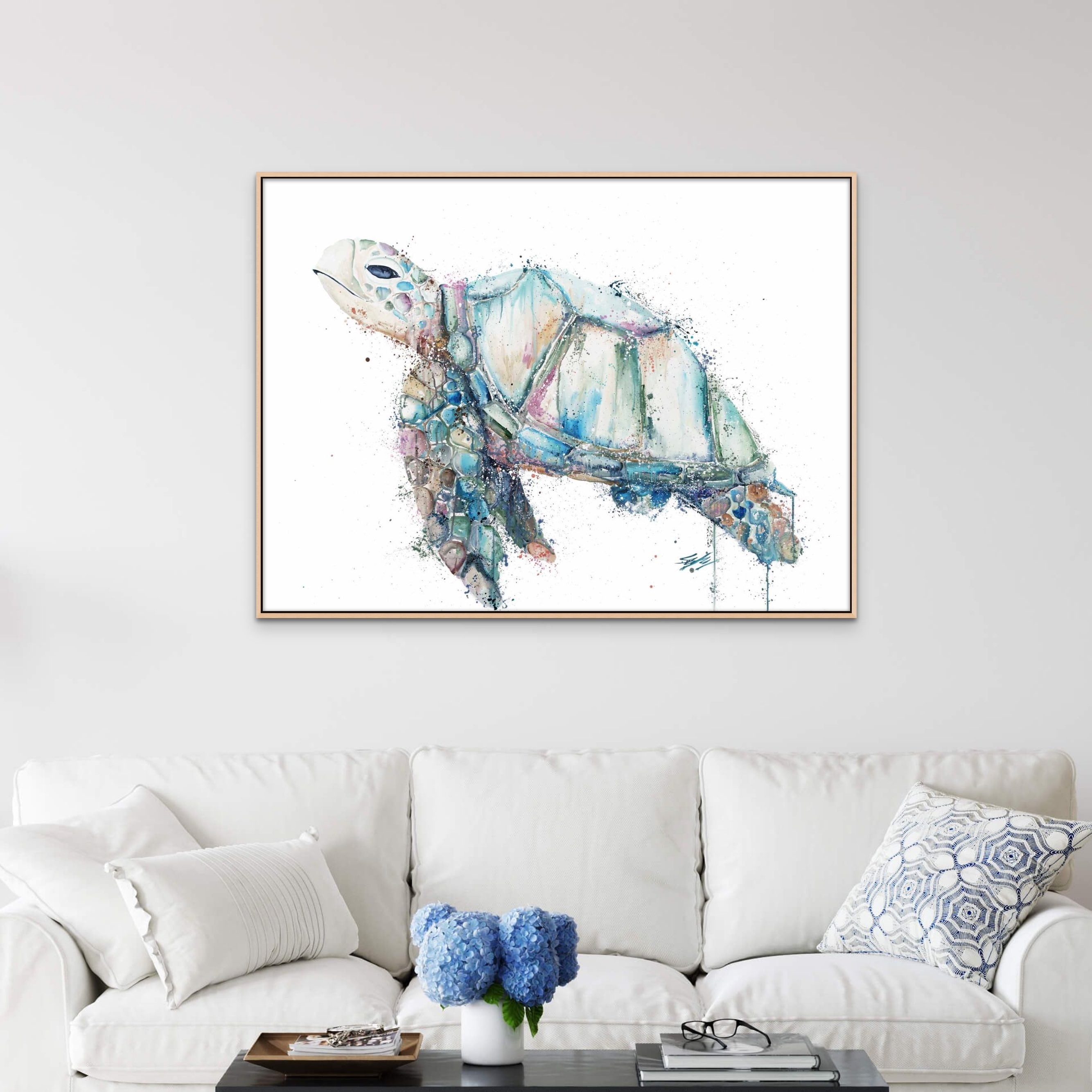 fine art turtle canvas print framed in oak hanging on wall