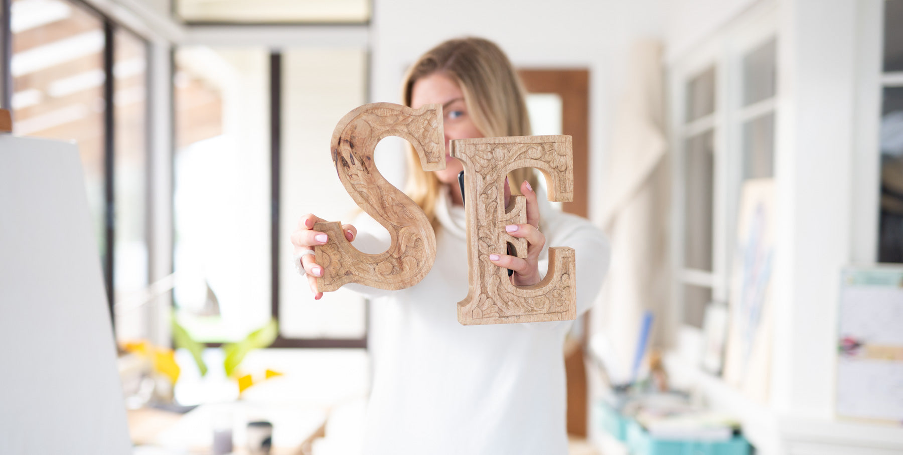 Stephanie Elizabeth holding letters S and E