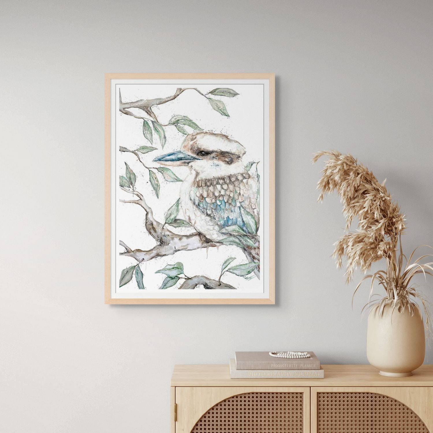 Watercolour and acrylic painting of a single kookaburra surrounded by leaves – fine art paper print by Stephanie Elizabeth