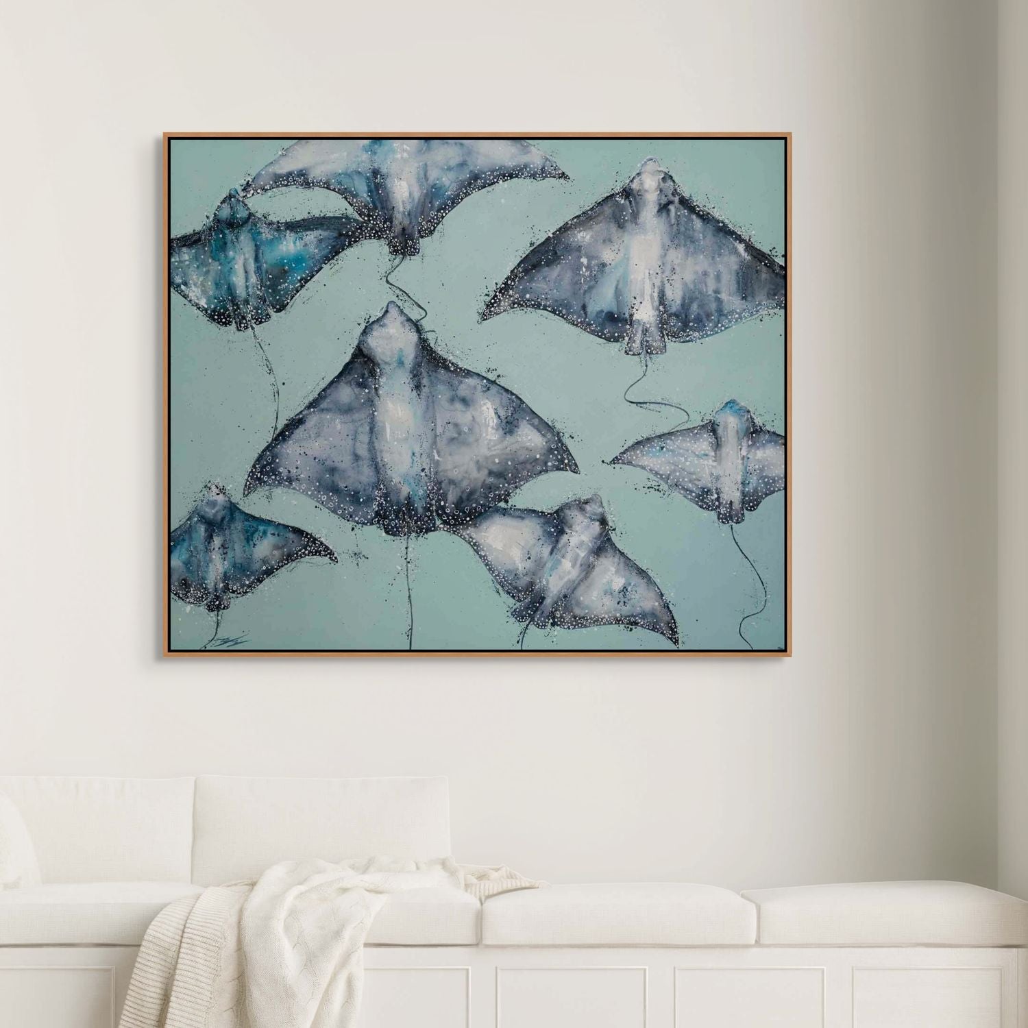 A Sea of Spots eagle rays painting by Stephanie Elizabeth – framed acrylic canvas artwork with green background 2
