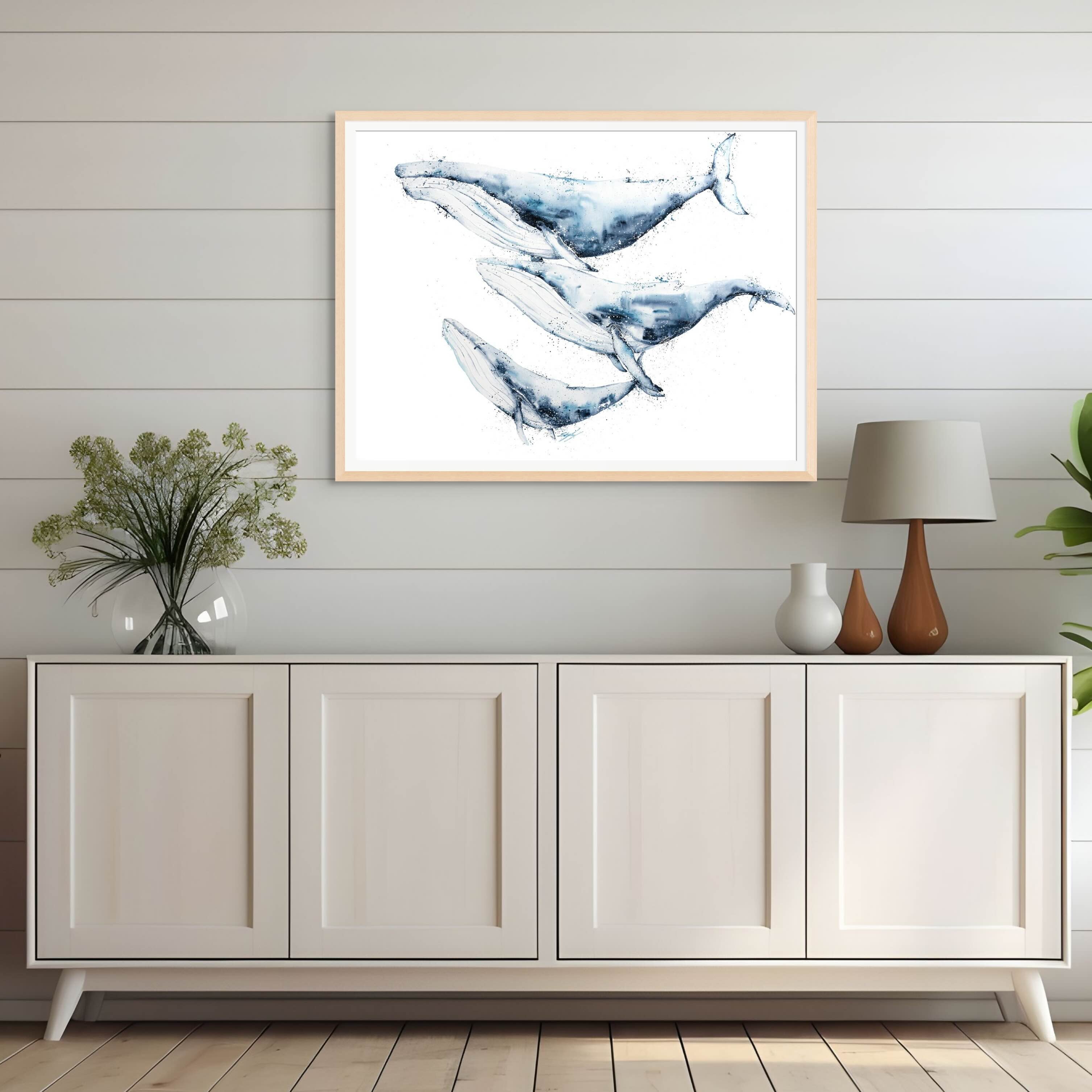 Fine art giclée print of When We Go, We Go Together, featuring three whales swimming side by side, painted by Stephanie Elizabeth, with vibrant ocean colours and intricate details.